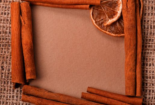 old paper for recipes and spices on burlap closeup