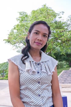 Thai Girl Portrait of happy tourist travel in Vacation.