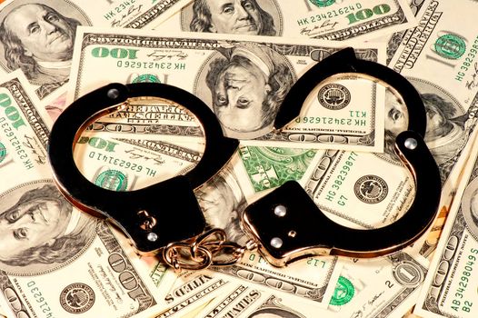 The handcuffs are on the chaotic dispersal of U.S. dollar banknotes