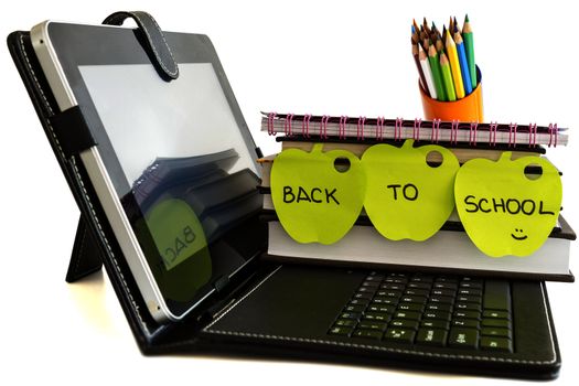Back to school with digital tablet pc, books and pencils on white background