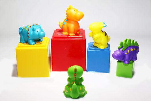 funny colored plastic dinosaurs for bathing babies