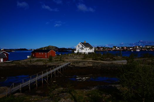 Picturesque town of Reine by the fjord on Lofoten islands in Norway