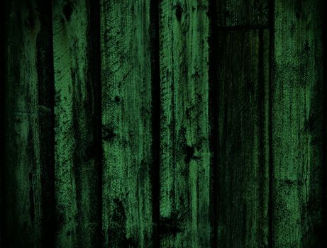 Background of grungy old wood planks in green tones