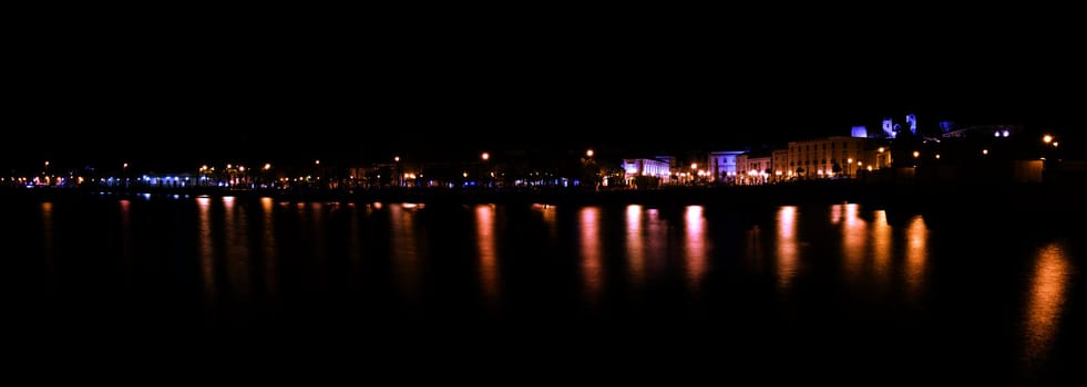 View of beautiful Tavira city in the night located in the Algarve, Portugal.