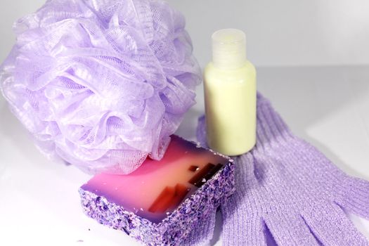 composition of sponge to wash,colored soaps and shampoo  bottle