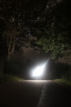 guy at night with mobile strobe unit