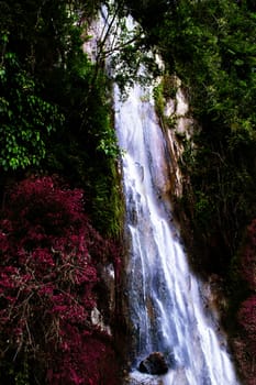 Waterfall near Tomok village. Samosir Island, Lake Toba, North Sumatra, Indonesia.