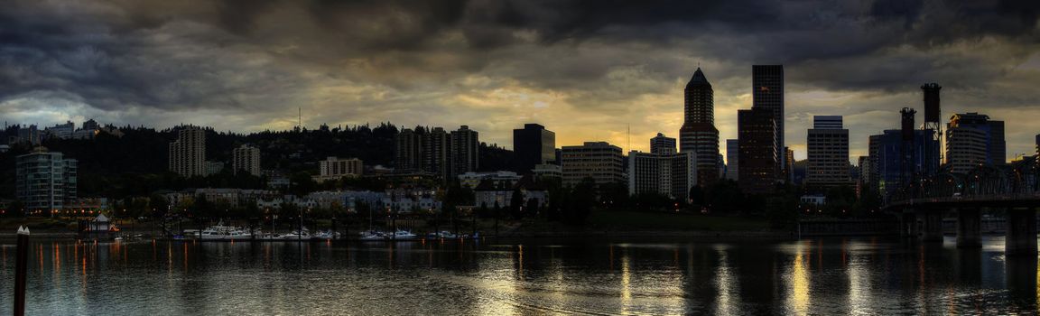 Stormy Sky Over Portland Oregon Waterfront Skyline Along Willamette River Panorama