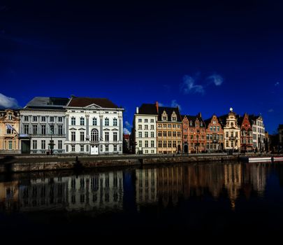 Travel Belgium medieval european city town background with canal. Koperlei street, Ghent, Belgium