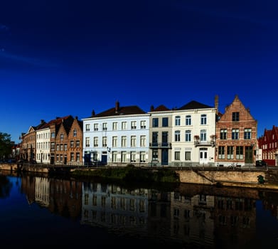 Canal and medieval houses. Bruges (Brugge), Belgium