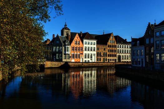 Canal and medieval houses. Bruges (Brugge), Belgium