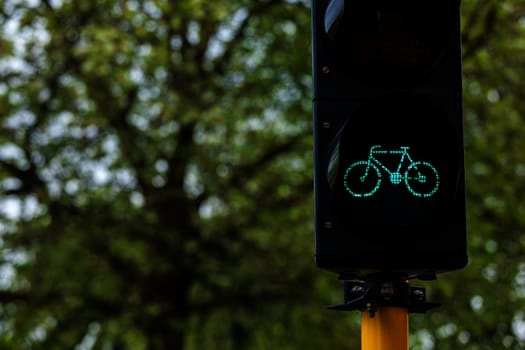 Bicycle ecological transport concept background - Bicycle traffic light in Europe. Brugge, Belgium