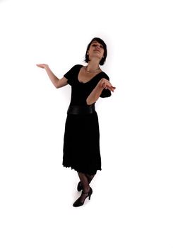 a young woman in strict black dress in studio looking like widow or nanny