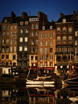 Honfleur harbour in France, in early morning light