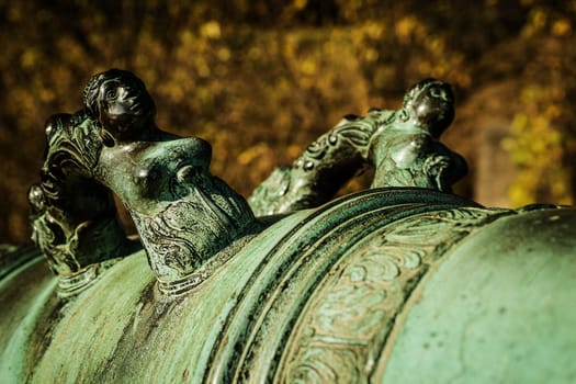 Detail of historical cannon tube on a sunny day