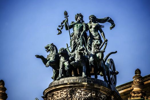 Statue on the top of the opera house in Dresden, Germany