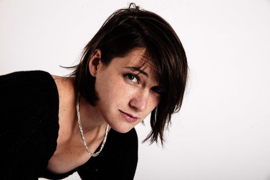 variation face of a young brunette woman on studio