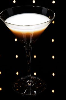 
Coffee Martini cocktail in front of disco lights