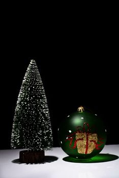 Christmas Tree and Christmas ball on a black background