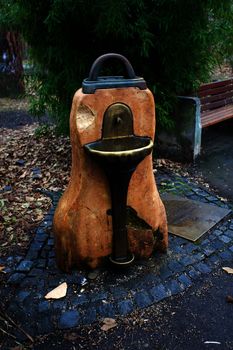 Old water drinking fountain in Vienna, Austria