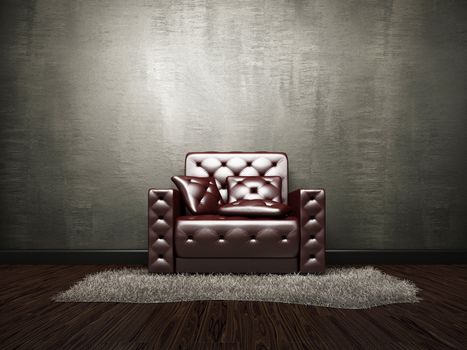 Leather armchair near the old grey cement wall 