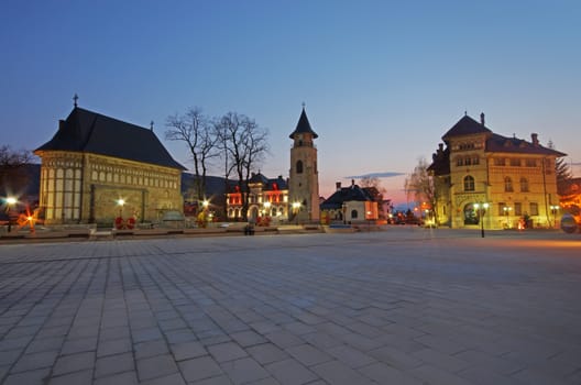 City square in Piatra Neamt: Royal Court  with Stephen the Great Church and Tower