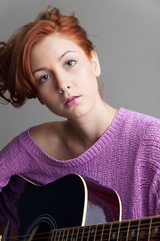 redhead with a guitar