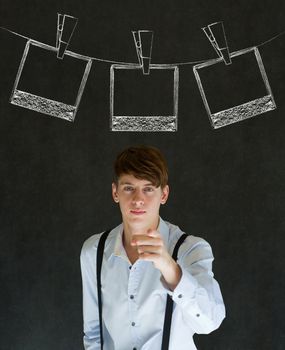 Businessman, teacher or student with chalk instant photograph style photographs on clothes line blackboard background