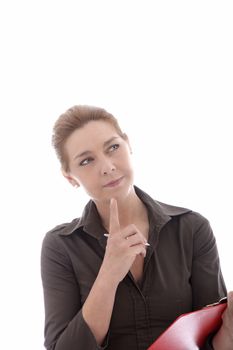 Looking up businesswoman thinking with finger on her chin