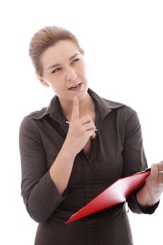 Thinking businesswoman with pen and red folder