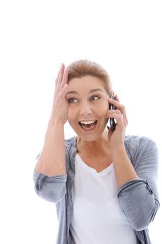 Screaming woman listening on the mobile phone