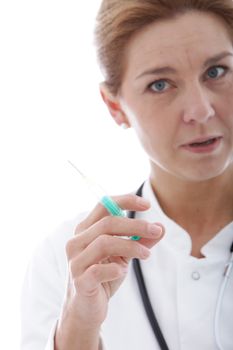 Close up portrait of medical doctor holding a syringe
