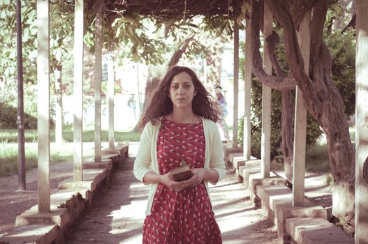 eastern hipster vintage woman at the park