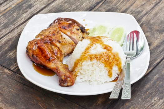 Grilled chicken rice with teriyaki sauce.