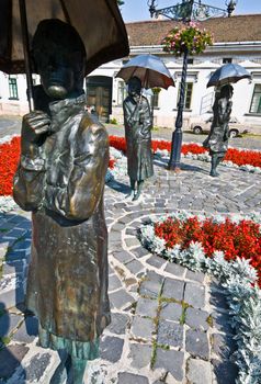 fountain showing woman with umbrellas in Budapest