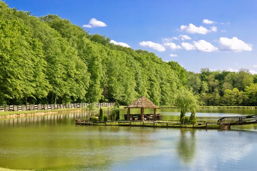 Wooden arbour on green lake, Prigorje region, Croatia