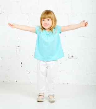 beautiful little girl playing and smilng, portrait