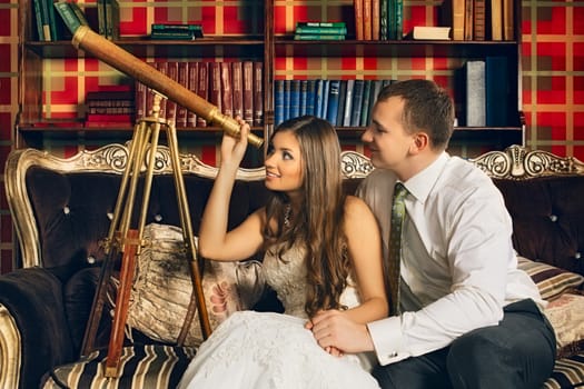 charming bride and groom in their house