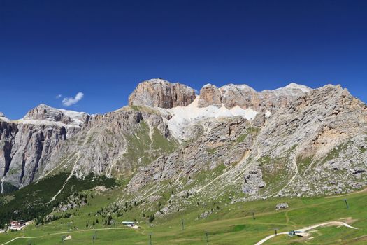 	summer view of Sass Pordoi mount and Fassa Valley, Italian Dolimites 