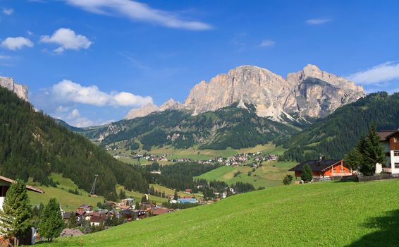 summer view in Badia Valley and the small Village Corvara, Alto Adige, Italy