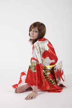 french young girl geisha in red silk kimono