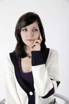 innocent young french woman on studio white background
