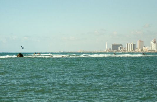 Sea coast and the view of the Tel Aviv from Old Jaffa at the evening .