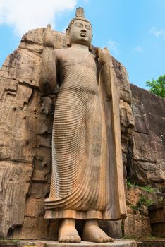 Avukana standing Buddha statue, Sri Lanka. 40 feet (12 m) high, has been carved out of a large granite rock in the 5th century.