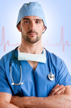 Young male surgeon with scrubs and a stethoscope, with a EKG graph behind him
