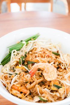 Stir fried noodle with shrimp in thai restuarant