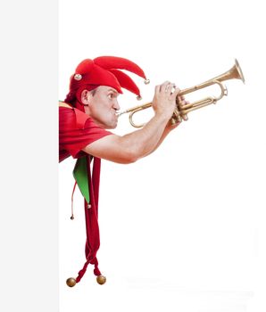 jester - entertaining figure in typical costume blowing trumpet