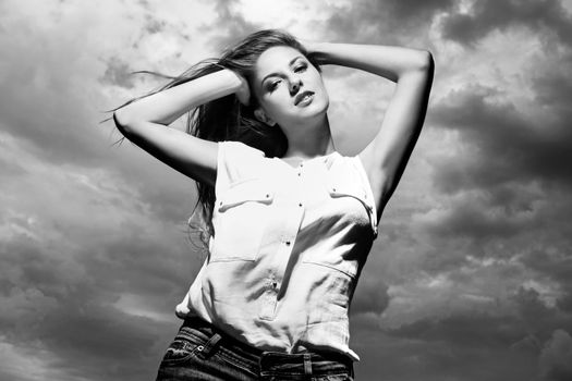 Beautiful caucasian woman in casual over sky background