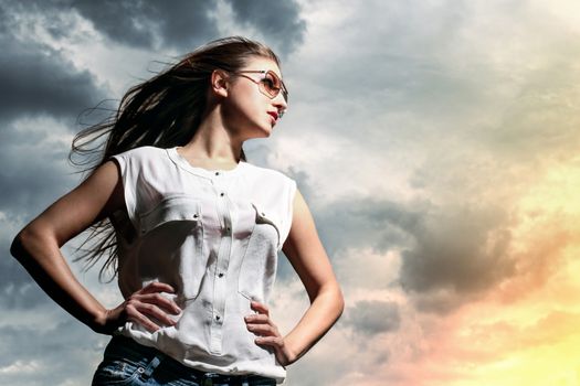 Beautiful caucasian woman in casual over sky background