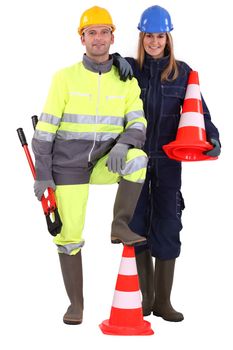 female and male road workers posing together